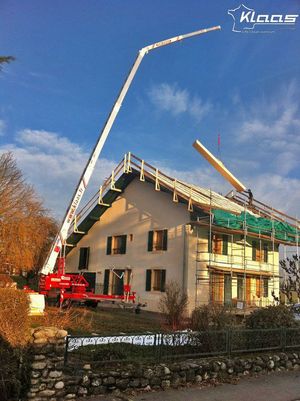 grue sur remorque pour charpente