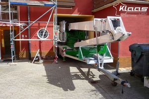 grue sur remorque porte