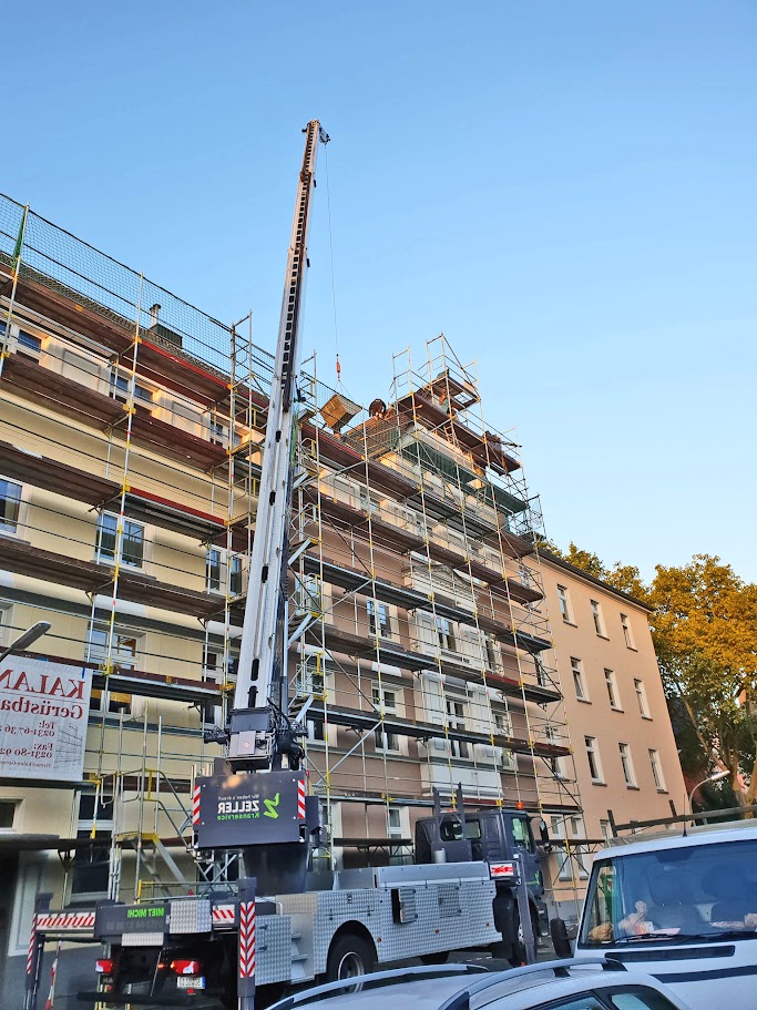 Grue sur camion avec benne